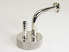 Stainless steel vacuum port rear-right view showing elbow tube rising to KF flange and 3/8" barbed nipple on knurled base
