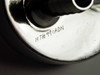 Close-up of vacuum port base underside showing hand-engraved marking HTH991ADN