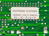 Digitrend Systems 8021312 warranty label closeup — reads DIGITREND SYSTEMS WARRANTY VOID IF REMOVED, part number 01-8021312 handwritten