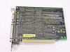 Diamond IO DIO-100 Rev C ISA card — solder side with yellow asset tag B069192 visible, DB25 and DB9 connectors visible at left edge