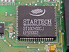Close-up of Startech Semiconductor ST16C452CJ EPS9302 dual UART chip on Boca Research BRI4340 ISA I/O card