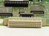 Close-up of ELCO 59-pin backplane edge connector on HP A-3210-48 module with ALUS logic ICs visible
