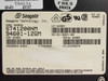 Seagate ST41200NM label closeup showing model numbers ST41200NM and 94601-12GM, part number 939003-032, serial number TJ724057, and Made in Singapore marking