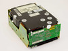 Seagate ST41200NM 1.2GB 5.25" Full Height SCSI-2 hard drive — three-quarter view showing PCB underside and SCSI connector with metal mounting bracket