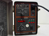 Scientific Atlanta A931 powered on showing red LED display reading Signal with case open and AC recharge cord connected