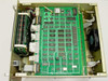 Hughes Synchronous Command Generator interior top view showing A2 main PCB assembly with multiple ICs, ribbon cables, and cooling fan