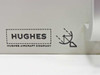 Hughes Aircraft Company logo and satellite dish graphic on front panel corner