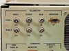 Close-up of rear panel telemetry section showing PCM 1 and PCM 2 BNC connectors (NRZ-L, Clock, BI-Phase) labeled J8–J13, and Monitor D-sub J7