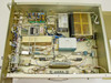 Hughes 3878540-100 internal view with top cover removed showing RF circuitry, coaxial interconnects, internal power supply module, and signal processing subassemblies