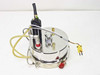 Top-down view of stainless disc assembly showing mounted actuator, fittings, thermocouple connector, and flexible tubing