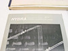 ISR Spraycool documentation close-up — Fluke Hydra Application Software Hydra Logger Package manual cover visible