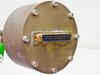 Micro Weld A554 large brass cylinder end face showing D-Sub multi-pin connector with surrounding bolt pattern