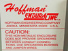 Hoffman Endura-Line label showing non-metallic enclosure caution regarding grounding between conduit connections — use grounding bushing and jumper wires