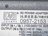 HP 0957-2153 rating label showing AC Power Adapter, INPUT 100-240V 1A 50/60Hz, OUTPUT 40W Max, +32V 940mA, +16V 625mA