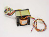 Sysmex PT-041 power transformer front-left view showing laminated core, copper winding, and multi-color wiring harness with white multi-pin connector