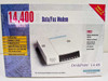 Microcom DeskPorte 14.4S 14400 bps Data/Fax Modem box front showing modem unit, feature bullet list, Windows 95 Compatible badge, and included accessories callout