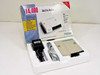 Microcom DeskPorte 14.4S Data/Fax Modem shown in original retail box with power supply and phone cable included