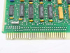 Close-up of PCB corner showing Maxim 54ACT ICs and edge connector fingers