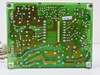 Radius 915-0028 power supply board – PCB solder side view showing green board traces and hand-written notation HTI 10-52