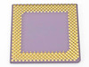 AMD K6-2/400AFR Socket 7 processor — underside showing full gold PGA pin array on ceramic substrate