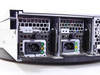 Dell PowerEdge 2850 rear close-up of dual redundant power supply modules with IEC C13 inlets and status LEDs