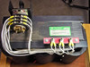 Quality Transformer Electronics 4690 — rear three-quarter view showing tap switch assembly at left, green label and red X1/X2/X3 terminal block at right, three transformer cores visible below