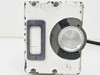 Traid Corp 1000-B – end panel view showing rectangular film port opening and large knurled adjustment/lens knob with attached cable