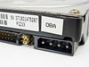 Quantum Fireball EX 8.4AT — rear connector detail showing 40-pin IDE interface, 4-pin Molex power connector, and OBA label