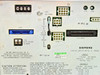 Siemens V30141 rear panel showing connector array including J9 +5V Output, J14 DC GND, J15 Ext. Fuse Alarm, J12 blue multi-pin connector, J16 +5VB from MSM, J10, J11 LCL, J13 MDF large multi-pin, J6, J17, J18 connectors, plus rating plate and Elgin Electronics label