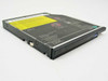 IBM 08K9647 ThinkPad UltraBay slim DVD-ROM drive — top angled view showing IBM logo, yellow laser warning label, and blue eject button