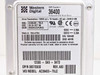 Western Digital WD Caviar AC36400 close-up of drive label showing model AC36400-75LC, Dell P/N 0007030D Rev A00, 6448.8MB capacity, Malaysia manufacture date Oct 1998