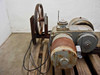 General Electric 7GP358MA3AA motor and gearbox — left-side view showing full assembly with large handwheel pulley and junction box