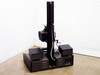 Mangum Sickles 01-9996 Film Duplicator – rear three-quarter view showing vertical column, base unit ventilation grilles, and rear power inlet panel