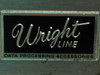 Wright Line Data Processing Accessories badge — black and chrome nameplate on brushed aluminum base of cart