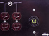 Liebert MP130E outlet panel close-up showing 4 NEMA outlets, two Push to Reset circuit breaker buttons, and Hubbell Twist-Lock UPS output receptacle (30A, 125V)