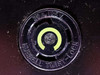 Close-up of Hubbell Twist-Lock receptacle on Liebert MP130E showing '30A, 125V' and 'HUBBELL TWIST-LOCK' markings with green indicator ring