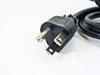 Vacuubrand ME 2S — closeup of included NEMA 5-15P power plug with light dust and surface wear on plug body and prongs