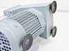 Vacuubrand ME 2S — top-rear view showing finned aluminum heat sink housing and two rear rubber feet, overall good cosmetic condition