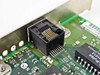 Compaq NC3121 NIC — close-up of RJ-45 port and Pulse 1012 magnetics transformer on PCB