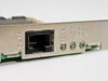 Compaq 323553-001 NIC bracket close-up showing RJ-45 DATA port and LINK, ACT, 100, TX LED indicators
