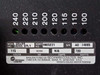 Coulter Delsa 440SX SPLY rating plate showing model DELSA 440SX SPLY, assembly 6605221, serial AD 14005, 115V, 720W, 50/60 Hz, Beckman Coulter Inc. Miami FL; voltage tap holes labeled 240 220 210 200 120 115 110 100