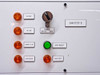 FSI ChemFill control panel detail showing Canister B section with N2 High, N2 Low, Cabinet Leak, Low Exhaust amber indicator lights, Power Off/On key switch, EPO Reset green button, and Rear Cover label