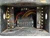Interior bottom compartment of Wheelco Model 402 showing wiring terminal block with labeled screw terminals including TC+, TC-, SHUNT, TCB+, TCB-, G, L1, L2 and numbered terminals, with red and yellow lead wires and central multi-pin connector block