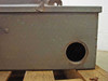 Side view of Square D H365 enclosure showing open round conduit knockout hole