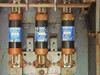 Interior view of Square D H365 showing three Brush ECSR 300 fuses installed in fuse holders across three phases