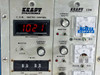Rear terminal block showing four labeled anode output terminals and corroded connection area