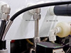 Close-up of nitrogen and DI Water In inlet fittings labeled on white panel surface with stainless steel compression fittings and tubing connections