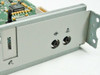 Apple 820-0972-A Sound Card rear bracket close-up – two 3.5mm audio jacks (line-in and line-out/headphone) with audio icons, and modem port at left