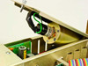Luxtron 755 HG internal detail – fluoroptic light source or detector module mounted in stainless steel housing with green wire lead and cylindrical lamp assembly
