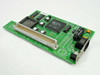 Asante MacLC III Ethernet NuBus card 09-00024-05C — angled top view showing ST-NIC chip, NuBus edge connector, and RJ-45 port